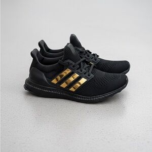 Adidas Black Sneakers with Gold Stripes